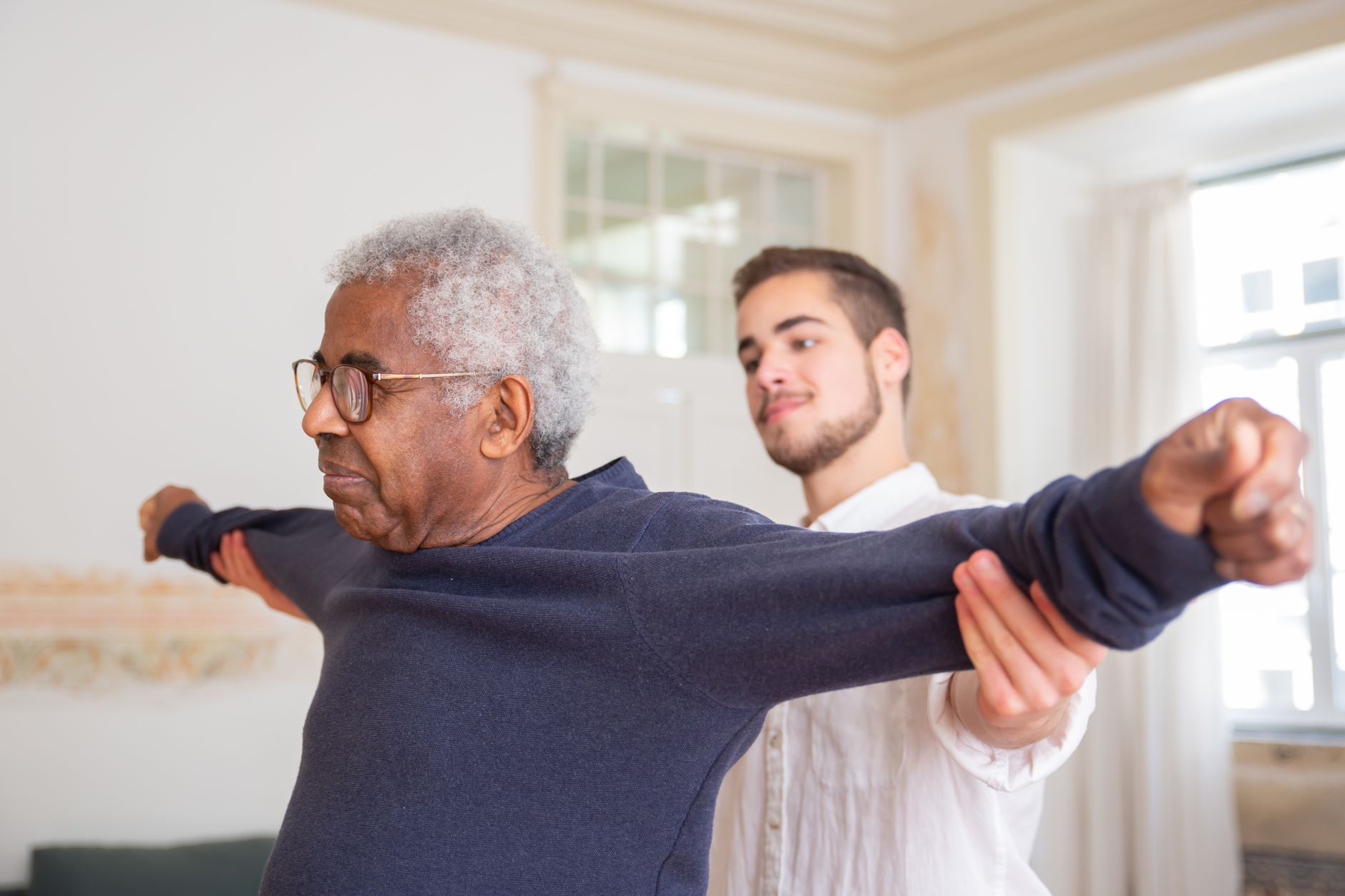 Doctor talking with elderly patient