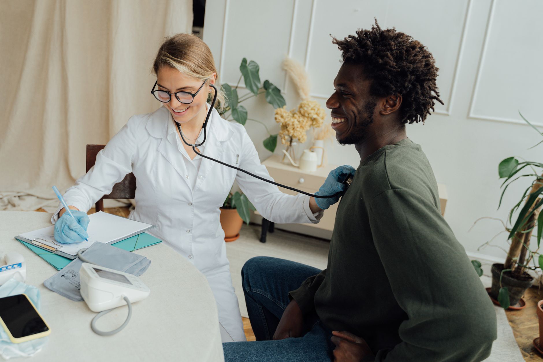 Doctor monitoring patient heart metrics